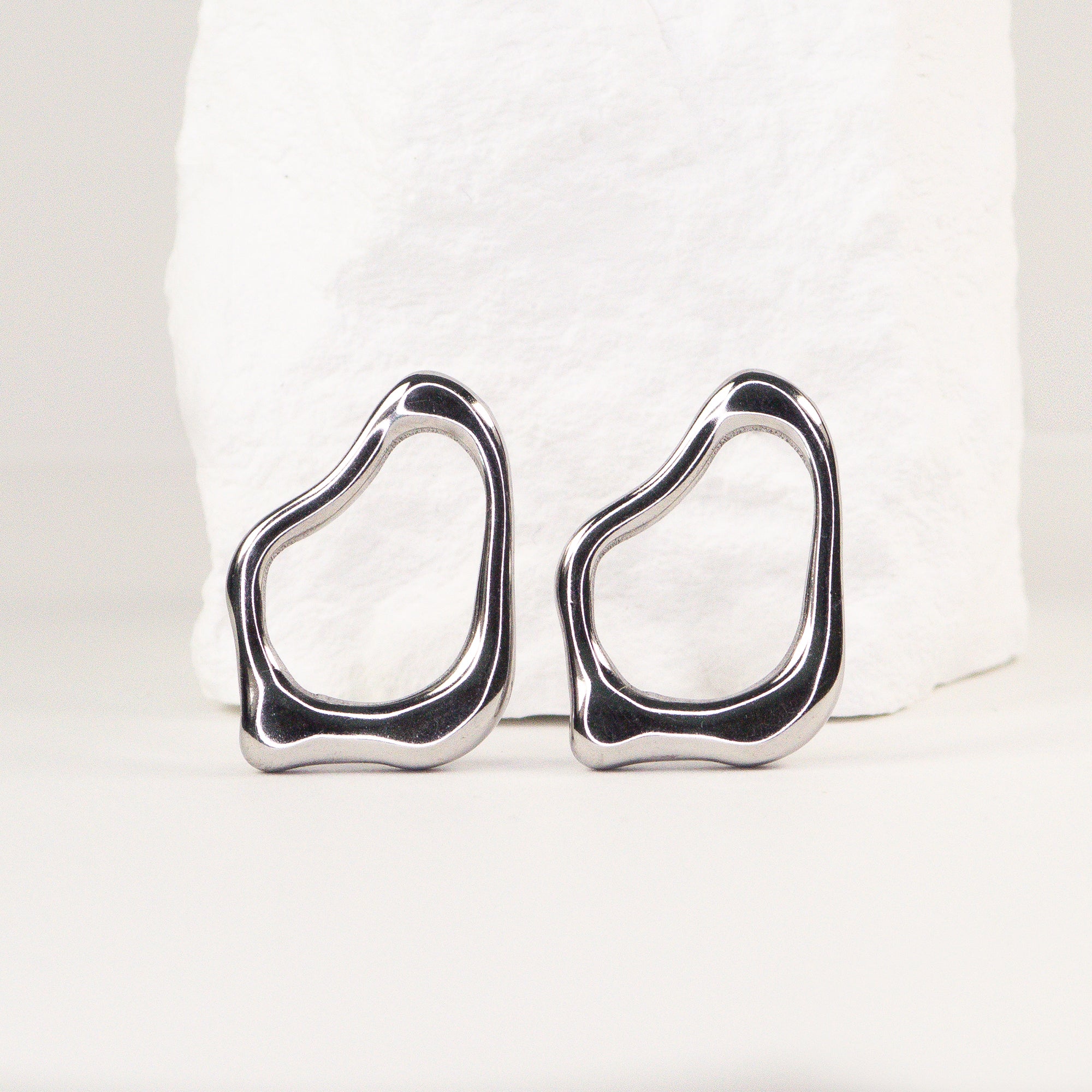 Elin Organic Shape Earrings silver flat lay — Tamola Jewellery