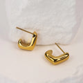 Solène Sculptural Huggie Earrings gold stainless steel — Tamola Jewellery