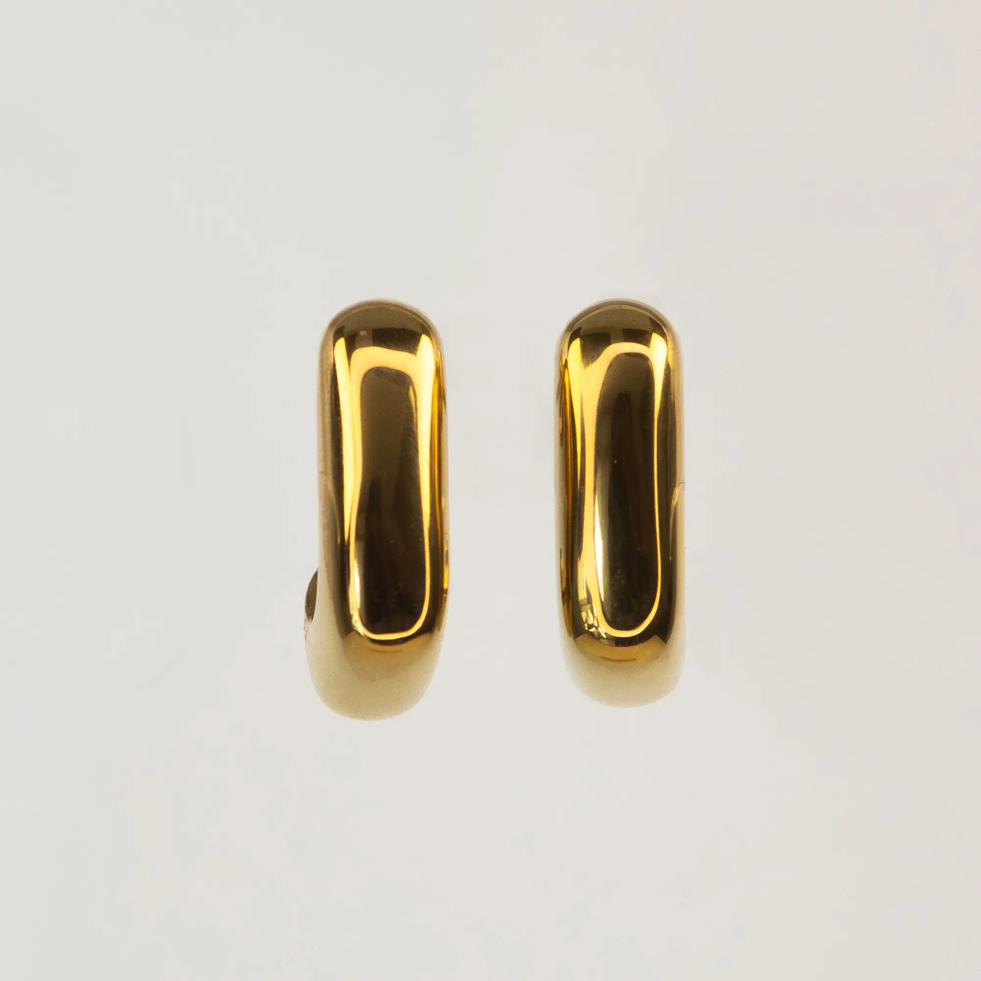 Solene Sculptural Huggie Earrings gold side view — Tamola Jewellery