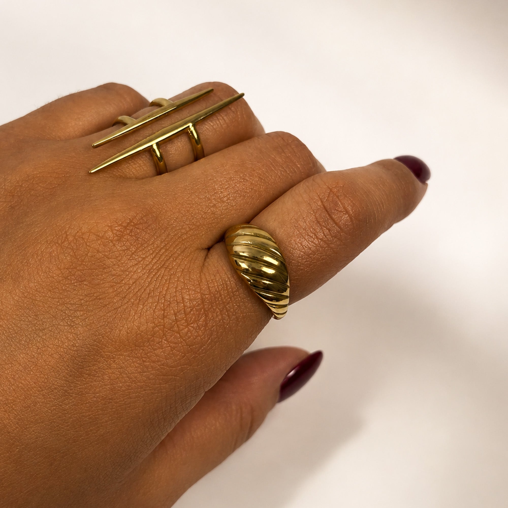 Camille Sculptural Dome Ring gold stainless steel on model hand — Tamola Jewellery